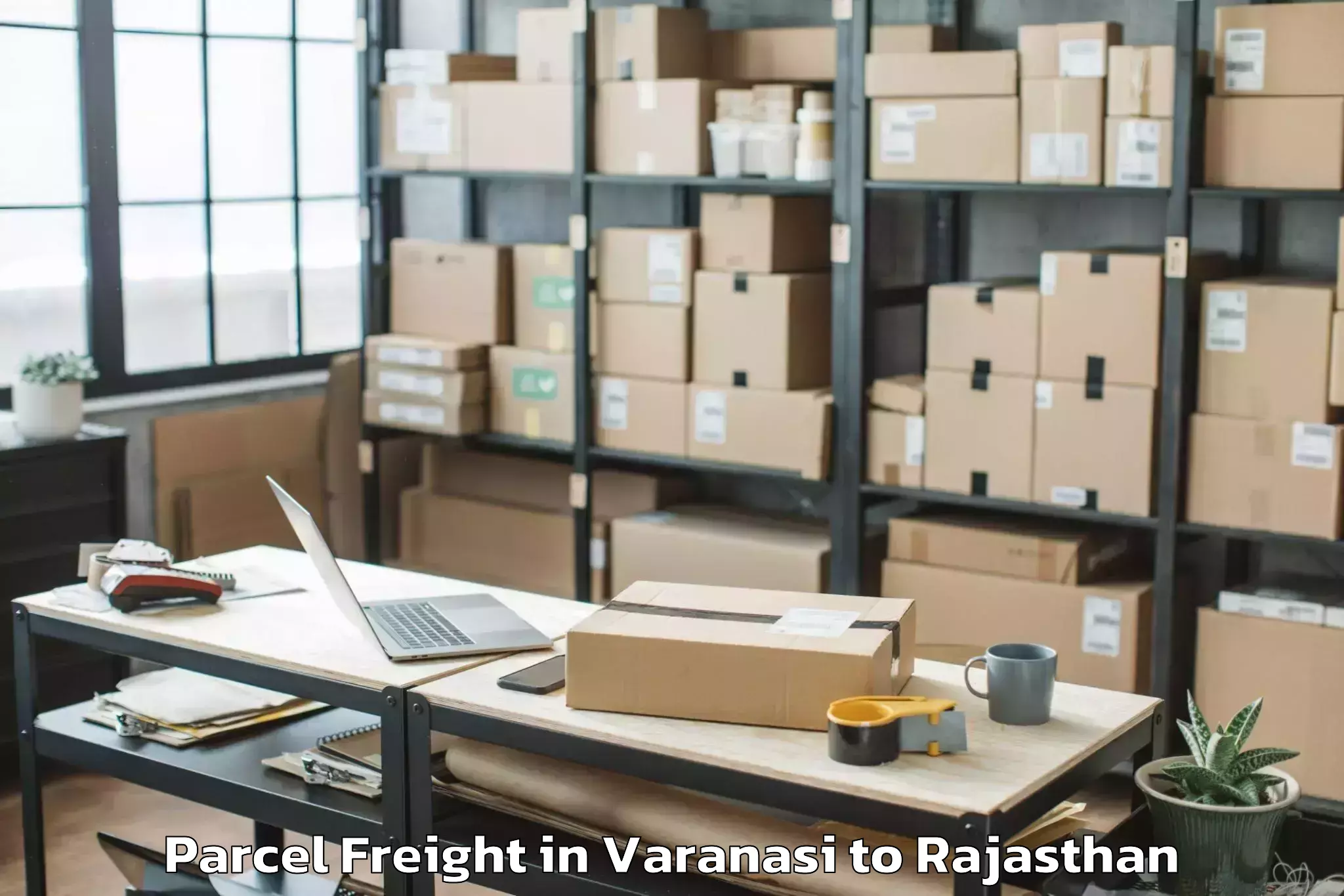 Book Your Varanasi to Raniwara Parcel Freight Today